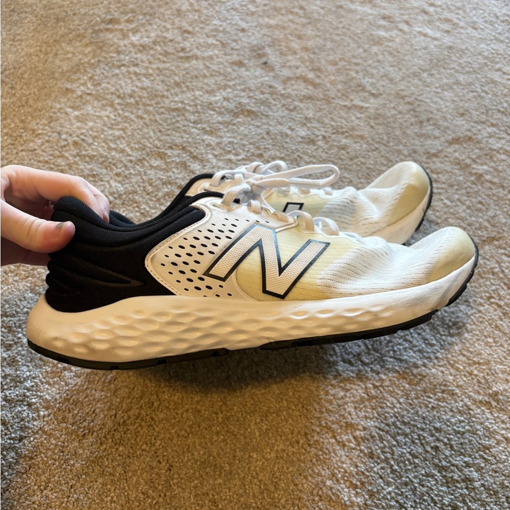 New Balance men’s White and Black Sneakers